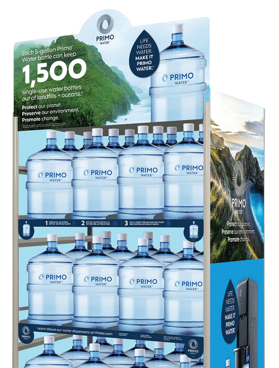 a Primo Water exchange rack full of 5 gallon bottles with sustainability message